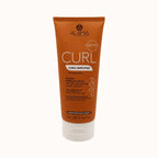 Alama Professional Curl, fluido modella ricci per capelli ricci 200 ml — packshot su fondo crema