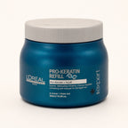 L'Oréal Série Expert Pro-Keratin Refill, maschera ristrutturante capelli danneggiati 500 ml — packshot su fondo crema