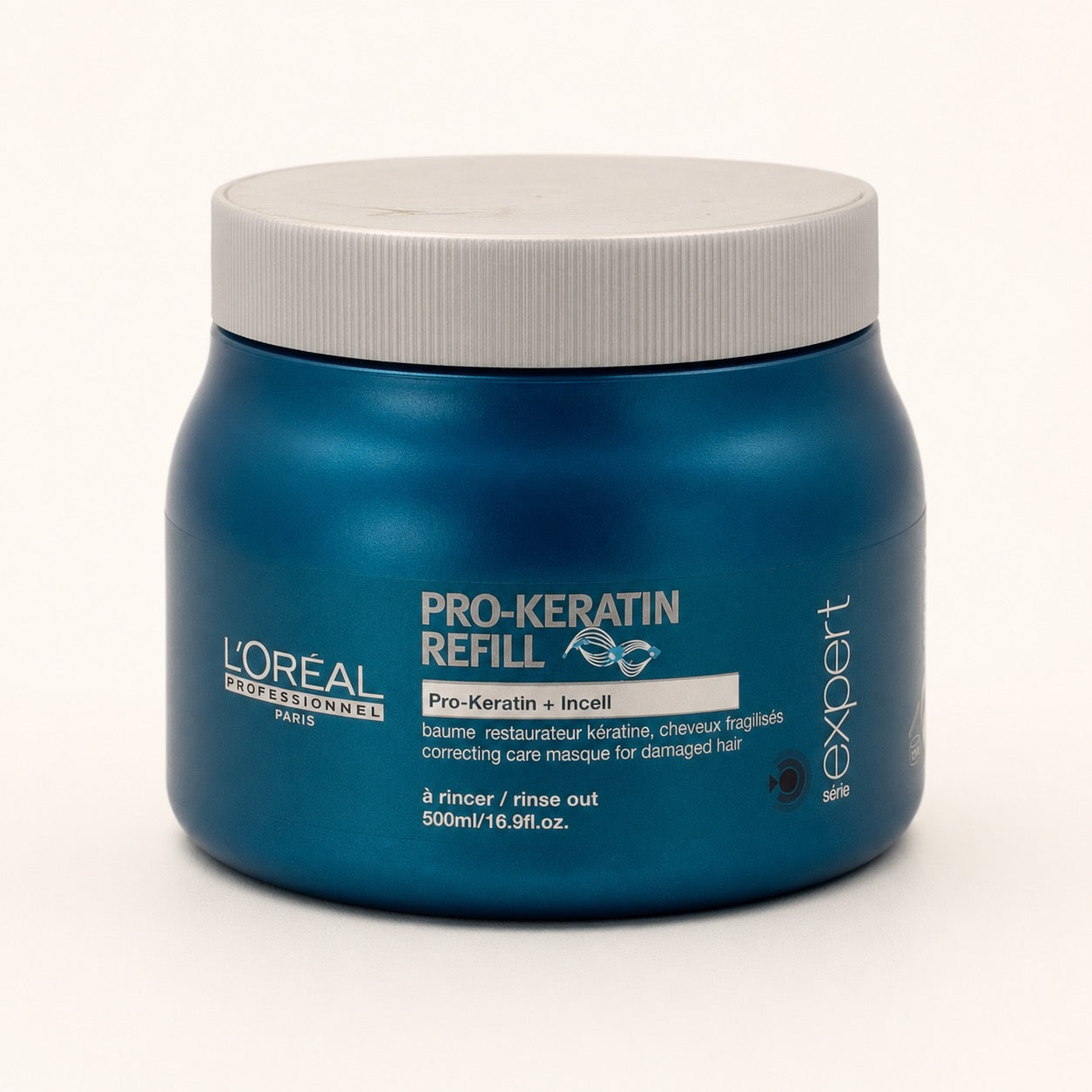 L'Oréal Série Expert Pro-Keratin Refill, maschera ristrutturante capelli danneggiati 500 ml — packshot su fondo crema