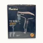 she Turbo 4500, phon asciugacapelli professionale — packshot su fondo crema