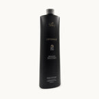 Silky Optimage Renouvelé, shampoo ristrutturante anti-età 1000 ml — packshot su fondo crema