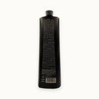 Silky Optimage Renouvelé, shampoo ristrutturante anti-età 1000 ml — packshot su fondo crema