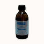 Spa Relax Aromatherapy, olio da massaggio 7 oli essenziali — packshot su fondo crema